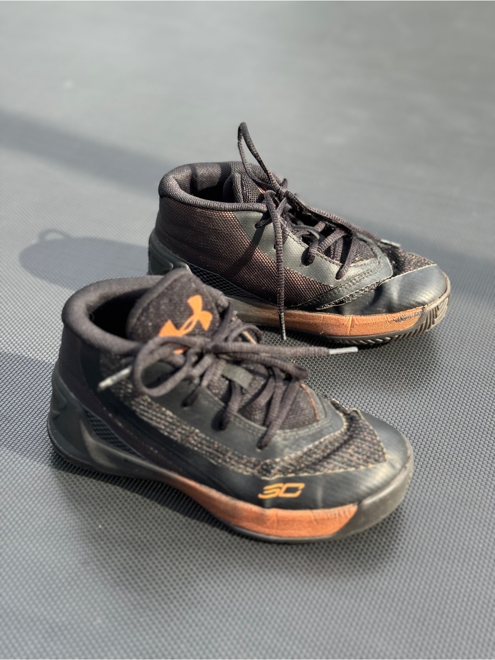Under Armour Kids Black Sneakers with Orange Accents